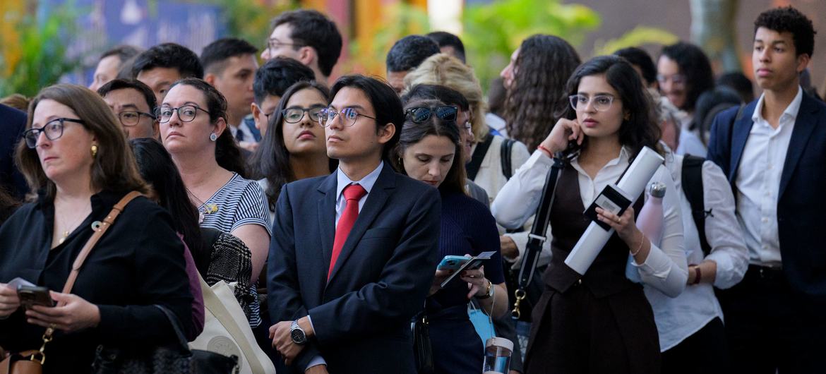 UN Photo/Manuel Elías Participants wait outside the General Assembly Hall at UN Headquarters during the first Summit of the Future Action Day.