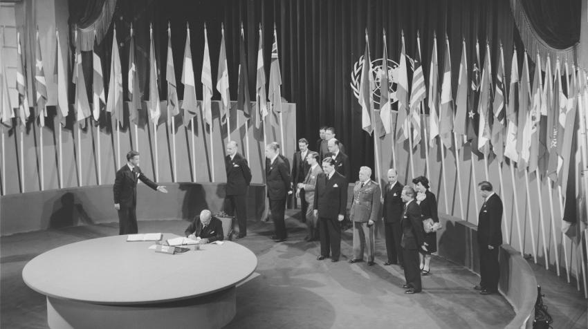 Pedro Leao Velloso, Minister of State for Foreign Relations, Chairman of the Delegation from Brazil, signing the Charter of the United Nations at the Veterans' War Memorial Building, San Francisco, United Sates, 26 June 1945. UN Photo/McLain Pedro Leao Velloso, Minister of State for Foreign Relations, Chairman of the Delegation from Brazil, signing the Charter of the United Nations at the Veterans' War Memorial Building, San Francisco, United Sates, 26 June 1945. UN Photo/McLain